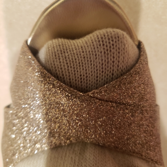 Gold shoe with light colored sock on per request - Picture 5 of 7